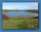 After a steep uphill hike, we encounter El Junco Lagoon,
the only fresh water lake in the Galapagos Islands.