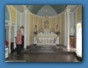 The inside of St Philomena Church with our tourguide.